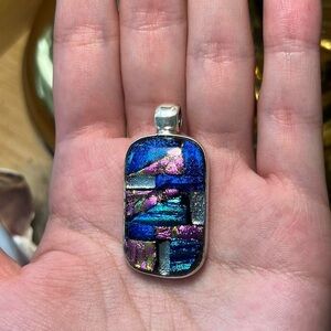 Absolutely stunning sterling silver dichroic glass pendant